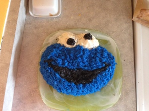 I made this Cookie Monster cake for Henry. It was my first time attempting to decorate a cake and I was pretty happy with the results even though I got icing all over my hands and a bit on Freddy's head also (he was clinging to my leg the entire time)