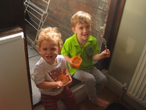 The boys in their favorite spot in the flat. They loved having breakfast right on the edge of the door to the balcony