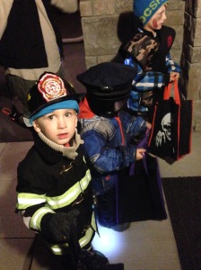 My little fireman, next to his cousins the policeman and the army ninja... 